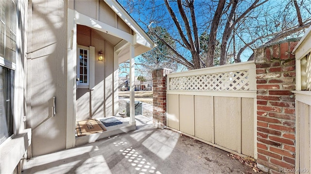 view of patio featuring fence