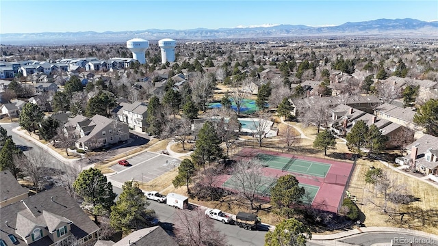 drone / aerial view with a residential view and a mountain view