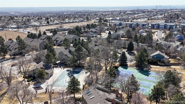 birds eye view of property with a residential view