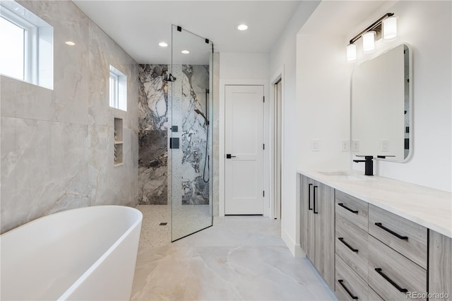 1953 W 47th Ave, Denver, CO 80211 - full bath with vanity, marble finish floor, recessed lighting, a soaking tub, and a marble finish shower
