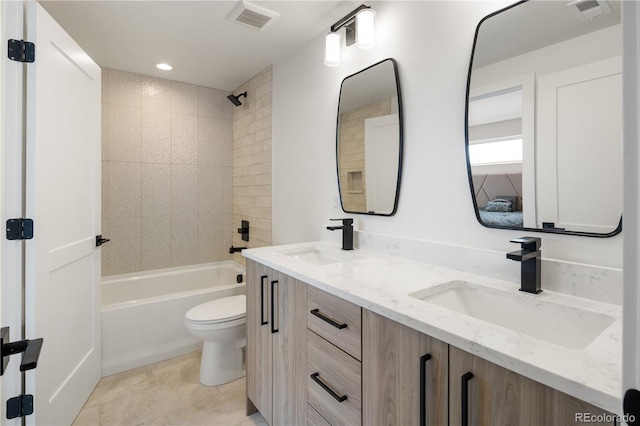 1953 W 47th Ave, Denver, CO 80211 - bathroom featuring a sink, toilet, double vanity, and visible vents