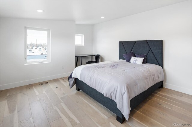 1953 W 47th Ave, Denver, CO 80211 - bedroom featuring light wood-style floors, baseboards, and recessed lighting