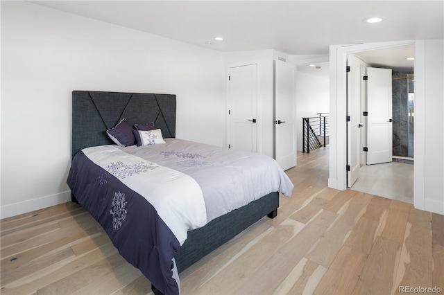 1953 W 47th Ave, Denver, CO 80211 - bedroom with recessed lighting, baseboards, and light wood-type flooring