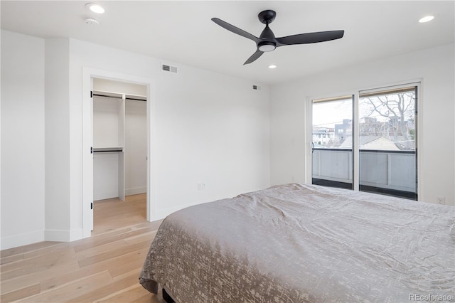 1953 W 47th Ave, Denver, CO 80211 - bedroom with recessed lighting, visible vents, wood finished floors, and a spacious closet