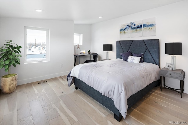 1953 W 47th Ave, Denver, CO 80211 - bedroom with light wood finished floors and recessed lighting