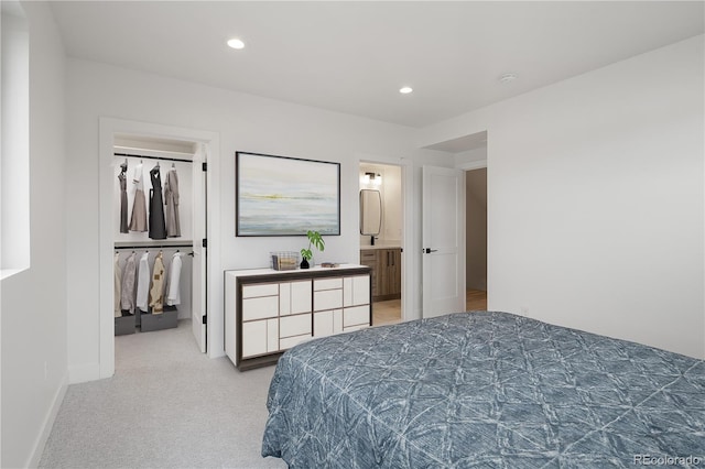 1953 W 47th Ave, Denver, CO 80211 - carpeted bedroom featuring a spacious closet, recessed lighting, and ensuite bath