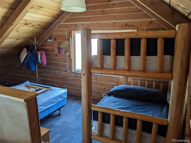 bedroom with vaulted ceiling, wooden ceiling, and wood walls