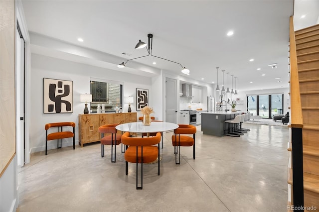 3409 Navajo St, Denver, CO 80211 - dining space with recessed lighting and concrete flooring