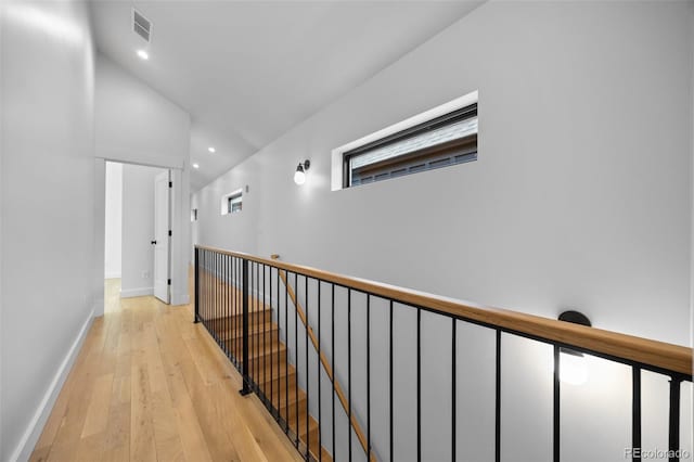 3409 Navajo St, Denver, CO 80211 - hall featuring light wood-type flooring, baseboards, recessed lighting, and an upstairs landing