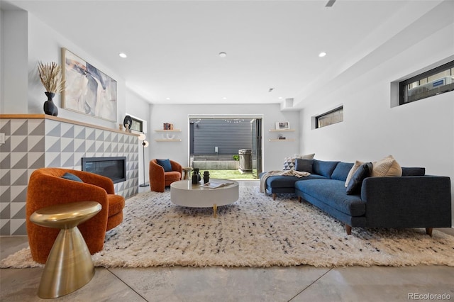 3409 Navajo St, Denver, CO 80211 - living room with a fireplace, finished concrete floors, and recessed lighting