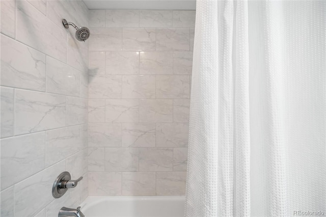 full bath featuring shower / bath combination with curtain