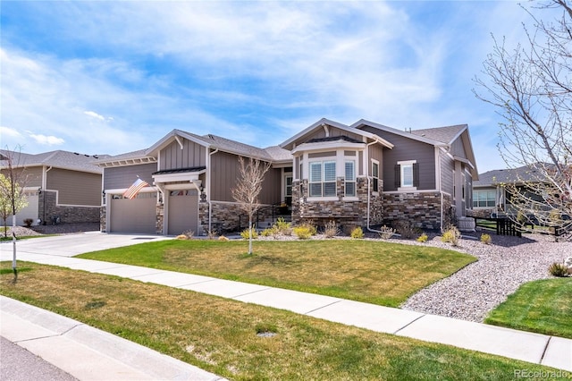 craftsman inspired home with a front lawn, stone siding, a garage, board and batten siding, and driveway