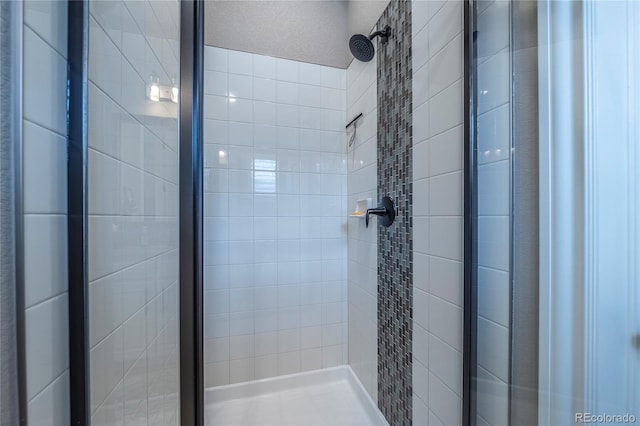 full bathroom with a shower stall