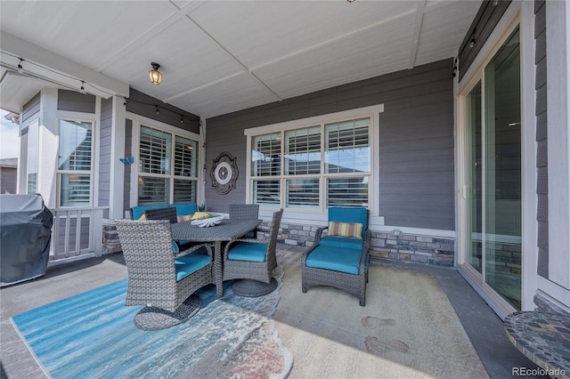 view of patio / terrace with grilling area and outdoor dining space