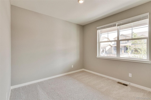 empty room with carpet floors