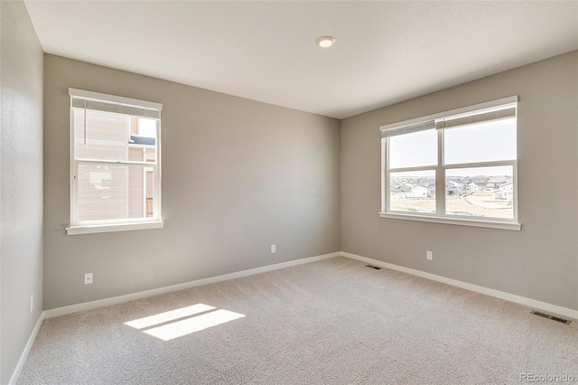 view of carpeted spare room