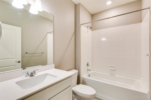 full bathroom with vanity, bathtub / shower combination, and toilet