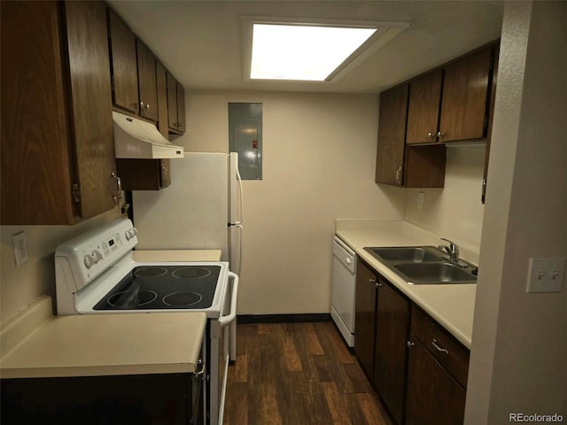 kitchen with dark brown cabinets, electric panel, dark wood-type flooring, sink, and white appliances