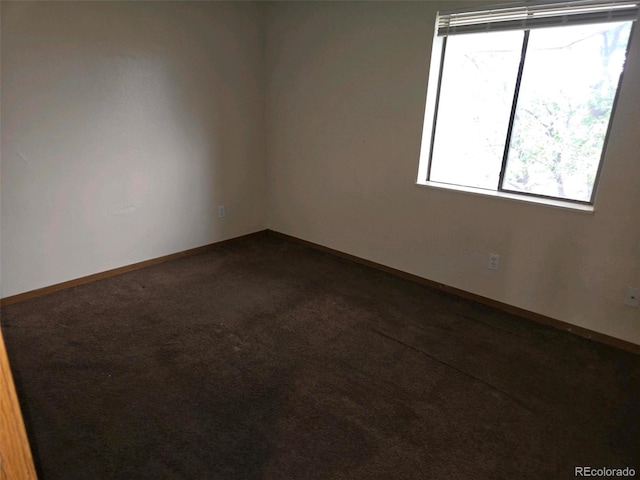 view of carpeted spare room