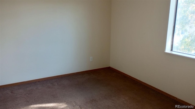 view of carpeted spare room