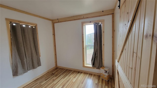 unfurnished room featuring light wood-type flooring