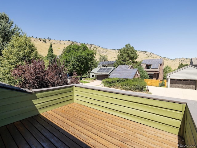 wooden terrace with a mountain view