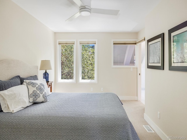 bedroom featuring ceiling fan and carpet flooring