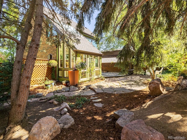 view of yard with a patio area