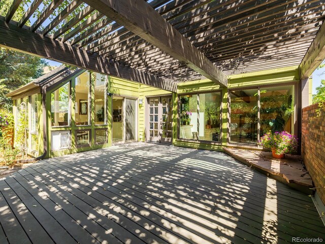 wooden terrace featuring a pergola