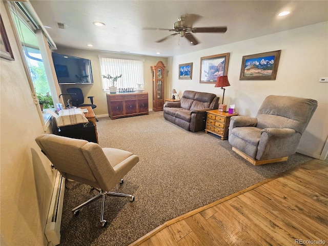 720 W 4th St, Julesburg, CO 80737 - living area with wood finished floors, recessed lighting, a ceiling fan, and baseboards