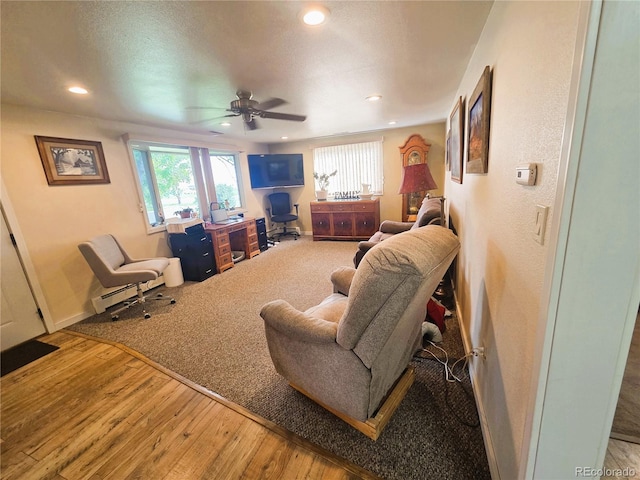720 W 4th St, Julesburg, CO 80737 - living room featuring hardwood / wood-style flooring, ceiling fan, recessed lighting, and baseboards