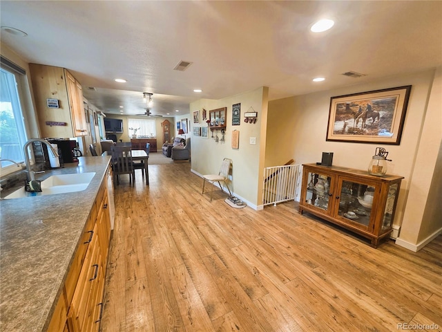 720 W 4th St, Julesburg, CO 80737 - kitchen featuring a sink, light wood finished floors, open floor plan, recessed lighting, and ceiling fan