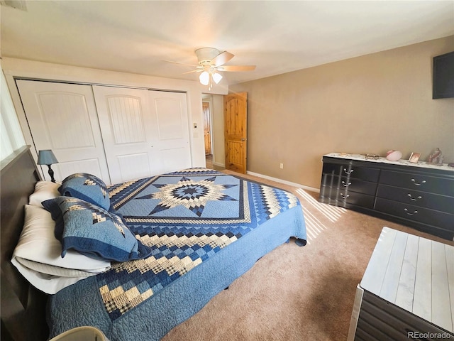 720 W 4th St, Julesburg, CO 80737 - bedroom with a closet, carpet floors, baseboards, and a ceiling fan