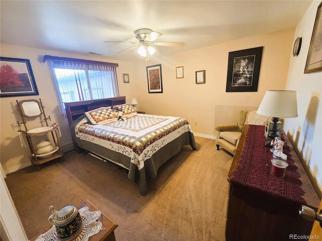 720 W 4th St, Julesburg, CO 80737 - bedroom featuring carpet, baseboards, and a ceiling fan