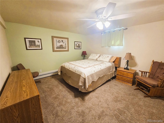 720 W 4th St, Julesburg, CO 80737 - carpeted bedroom featuring a baseboard radiator and a ceiling fan