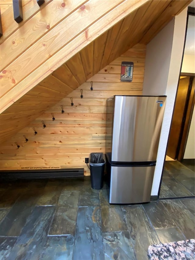 bonus room with lofted ceiling, wood walls, and wood ceiling