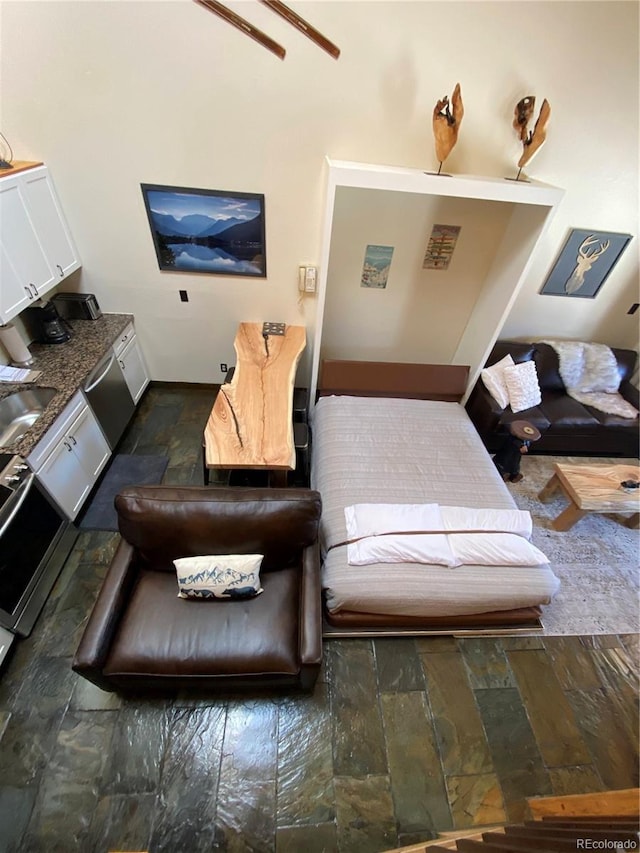 living area featuring stone finish flooring