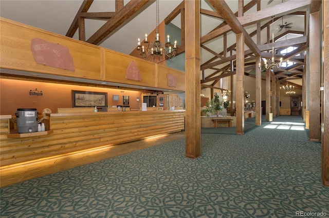 reception area featuring ceiling fan with notable chandelier