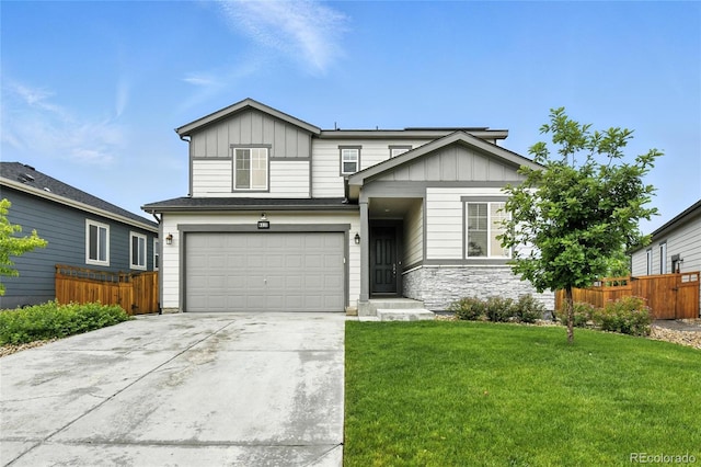 6513 Dry Fork Cir, Frederick, CO 80516 - view of front of home with board and batten siding, concrete driveway, a garage, and stone siding