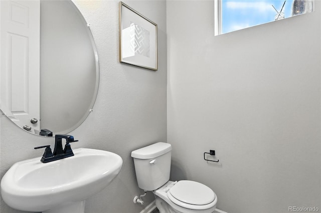 6513 Dry Fork Cir, Frederick, CO 80516 - bathroom featuring a sink and baseboards