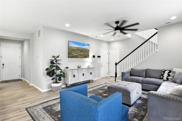 6513 Dry Fork Cir, Frederick, CO 80516 - living room featuring ceiling fan, wood finished floors, stairway, and recessed lighting