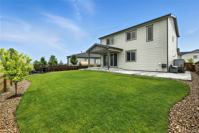 6513 Dry Fork Cir, Frederick, CO 80516 - back of property with a patio and a fenced backyard