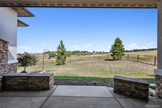 view of patio / terrace featuring a rural view