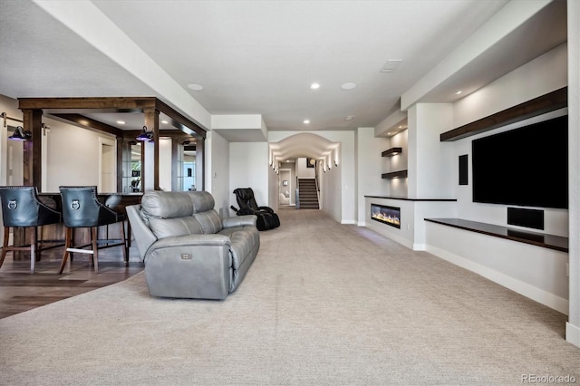 living room featuring dark hardwood / wood-style flooring