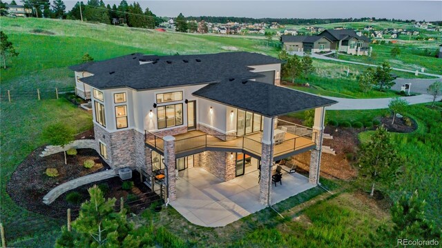 rear view of property featuring a patio and central AC unit