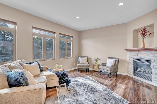 861 Circle Rd, Palmer Lake, CO 80133 - living room with recessed lighting, baseboards, wood finished floors, and a fireplace
