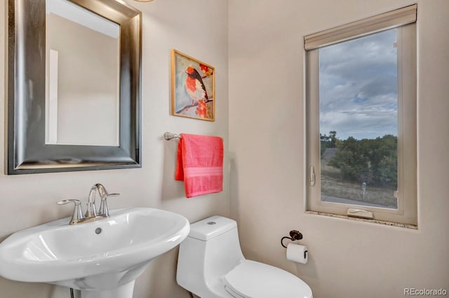 861 Circle Rd, Palmer Lake, CO 80133 - half bath with a sink and toilet