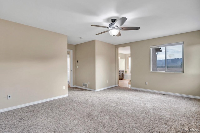 861 Circle Rd, Palmer Lake, CO 80133 - carpeted spare room featuring baseboards, a ceiling fan, and visible vents