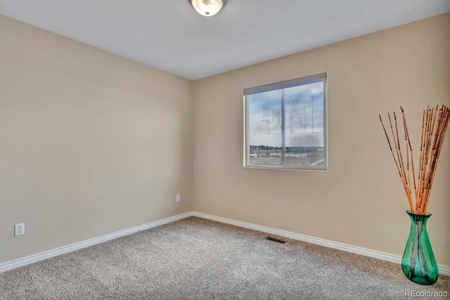 861 Circle Rd, Palmer Lake, CO 80133 - carpeted spare room featuring visible vents and baseboards