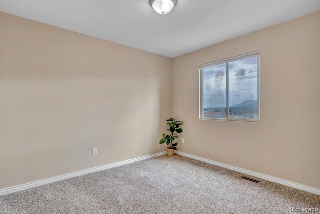 861 Circle Rd, Palmer Lake, CO 80133 - unfurnished room with carpet floors, baseboards, and visible vents